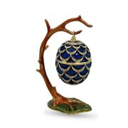 Faberge style egg Pine cone on the tree